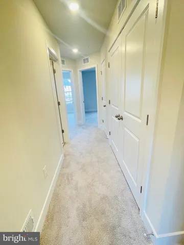 a view of hallway with stairs