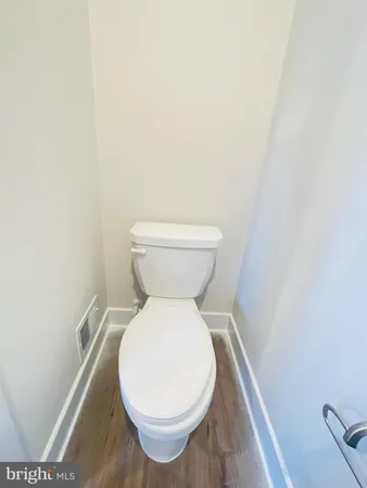 a close view of a toilet in bathroom