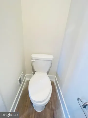 a close view of a toilet in bathroom