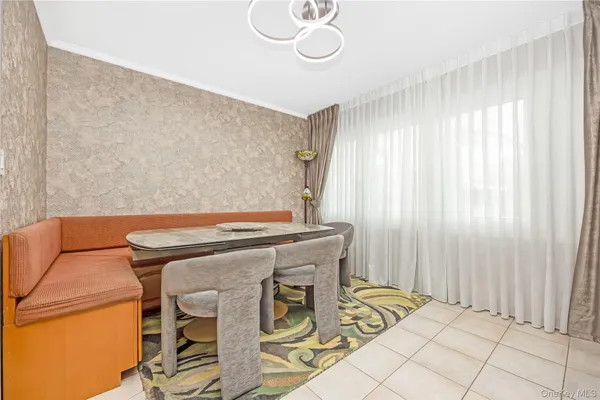 a spacious bathroom with a double vanity sink a mirror and a shower