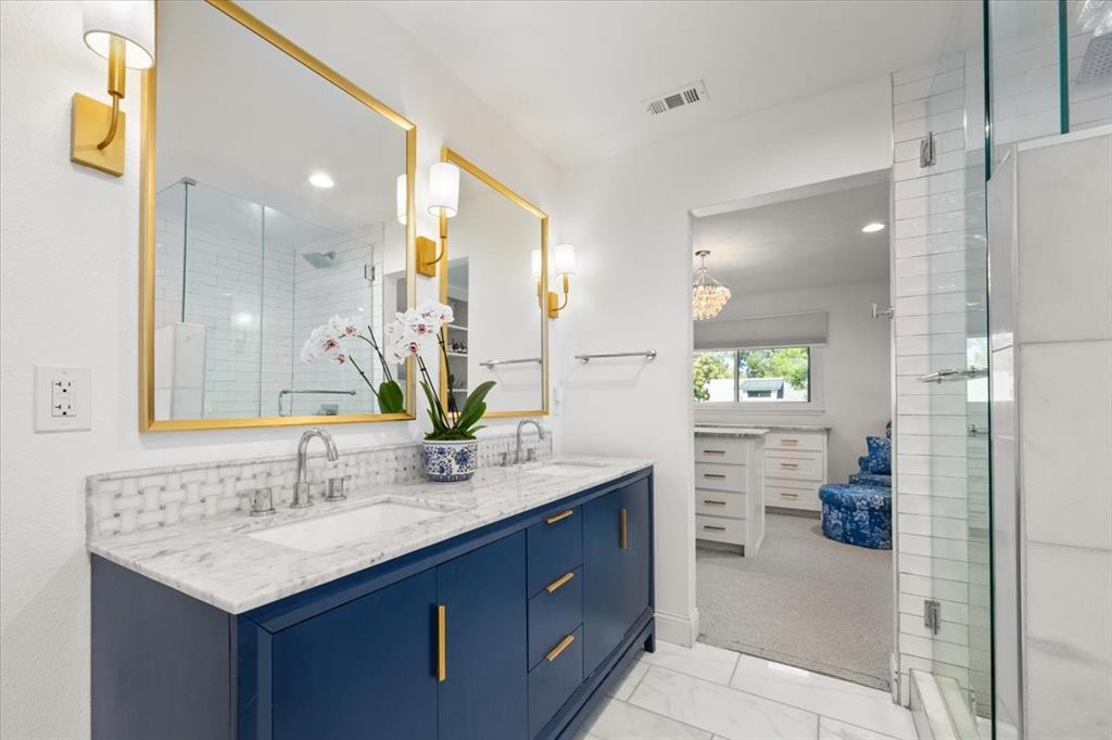 6305 Genoa Road Fort Worth, TX 76116 - Photo 17 of 33 a bathroom with a sink double vanity and a mirror
