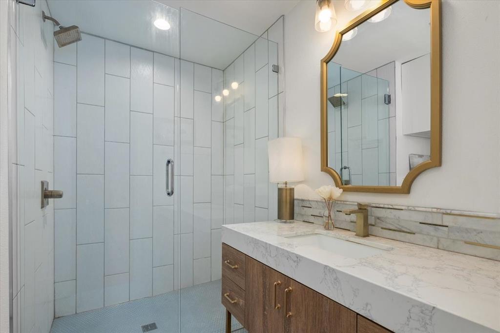 6305 Genoa Road Fort Worth, TX 76116 - Photo 22 of 33 a bathroom with a granite countertop sink mirror and double