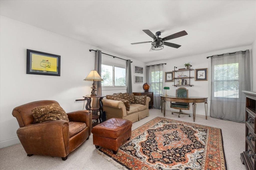 6305 Genoa Road Fort Worth, TX 76116 - Photo 25 of 33 a living room with furniture a rug and a window