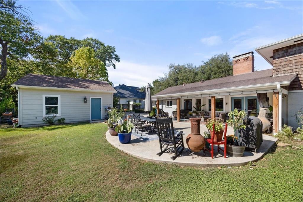 6305 Genoa Road Fort Worth, TX 76116 - Photo 30 of 33 a view of a house with backyard outdoor seating and covered with furniture