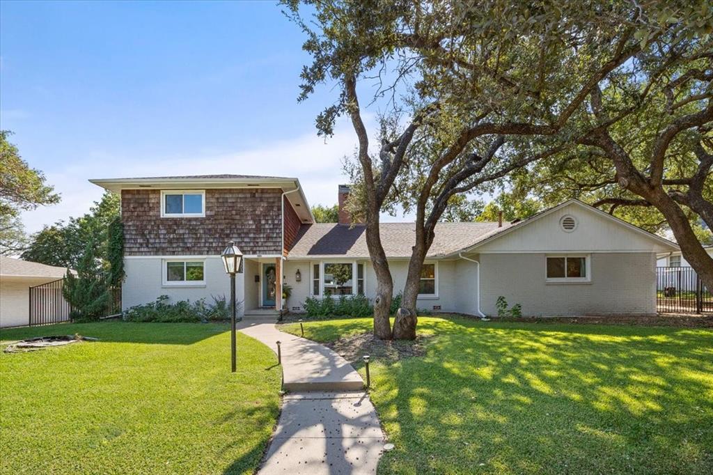 6305 Genoa Road Fort Worth, TX 76116 - Photo 33 of 33 a front view of house with yard and green space