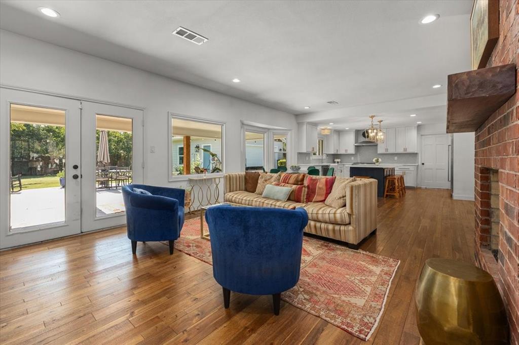 6305 Genoa Road Fort Worth, TX 76116 - Photo 5 of 33 a living room with furniture and a table