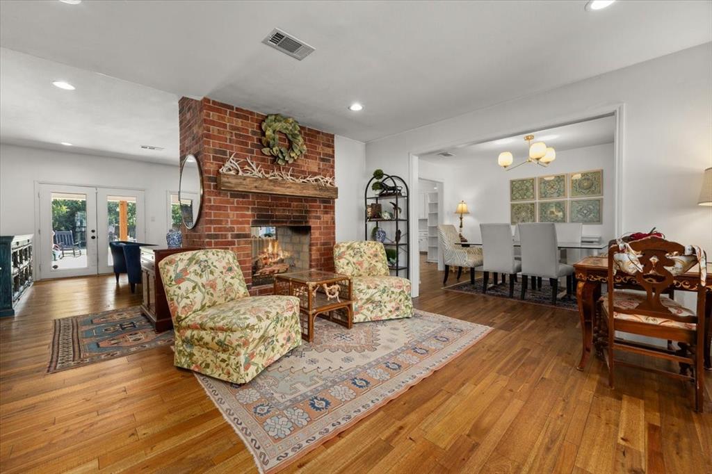 6305 Genoa Road Fort Worth, TX 76116 - Photo 8 of 33 a living room with furniture and wooden floor