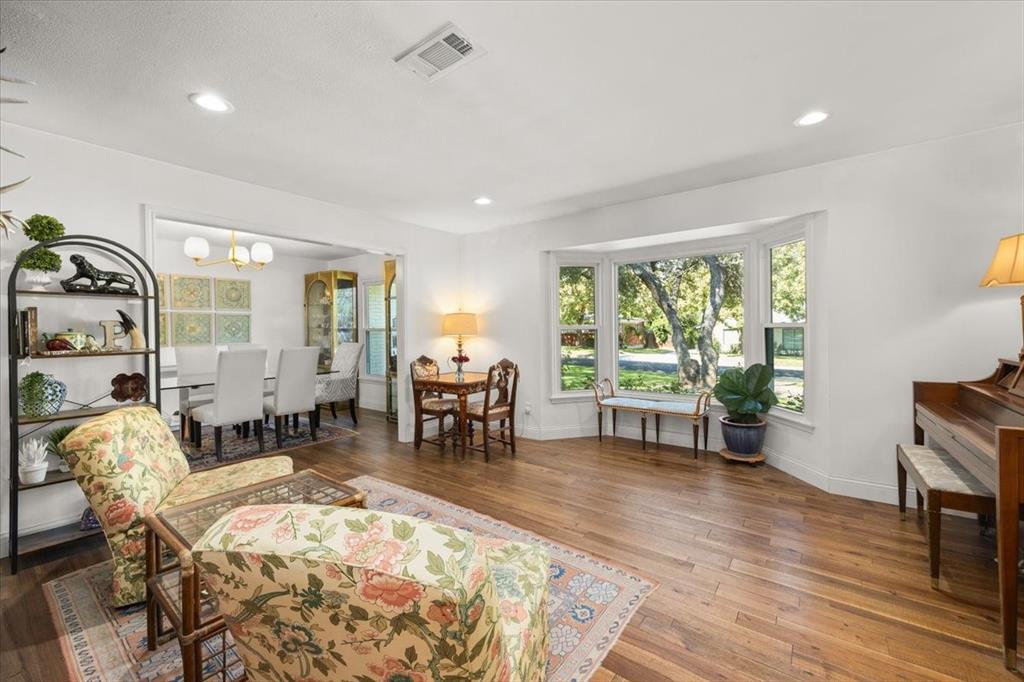 6305 Genoa Road Fort Worth, TX 76116 - Photo 9 of 33 a living room with furniture and a wooden floor