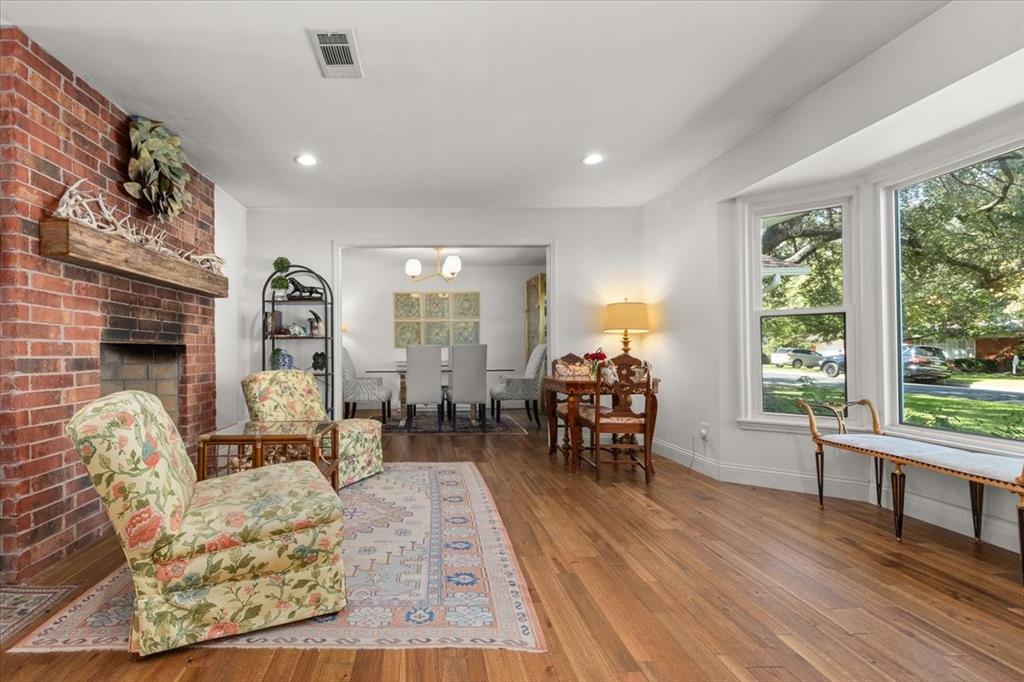 6305 Genoa Road Fort Worth, TX 76116 - Photo 10 of 33 a living room with furniture and a wooden floor