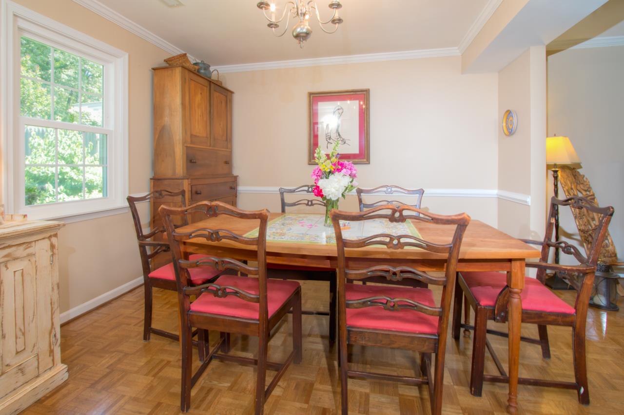 317 North Bennington Road Charlottesville, VA 22901 - Photo 7 of 26 a view of a dining room with furniture and a window
