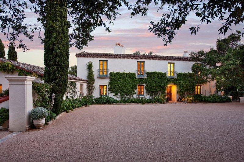 front view of a house with a street