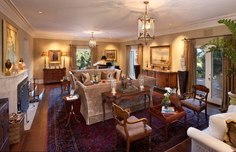 810 Lilac Drive Montecito, CA 93108 - Photo 3 of 14 a view of a dining room with furniture a chandelier and wooden floor