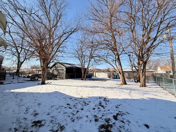 a street view covered with snow