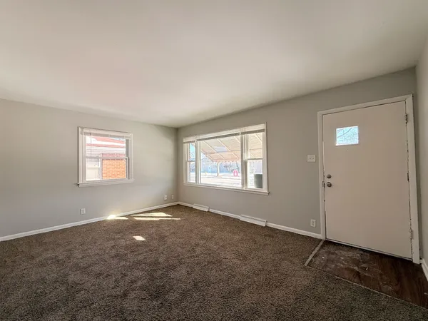 an empty room with windows