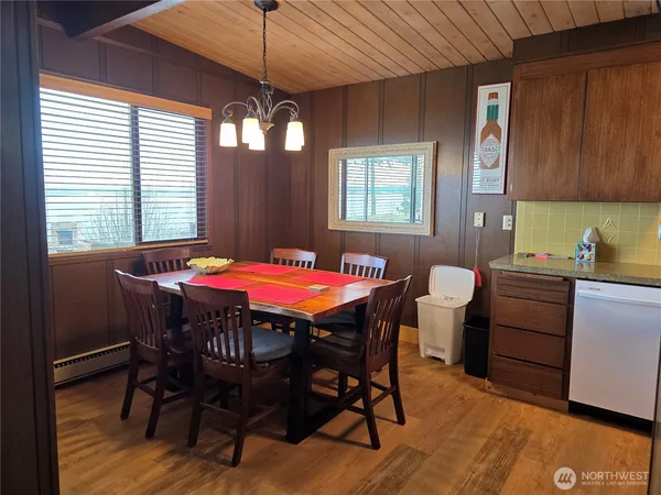 a kitchen with refrigerator and washer
