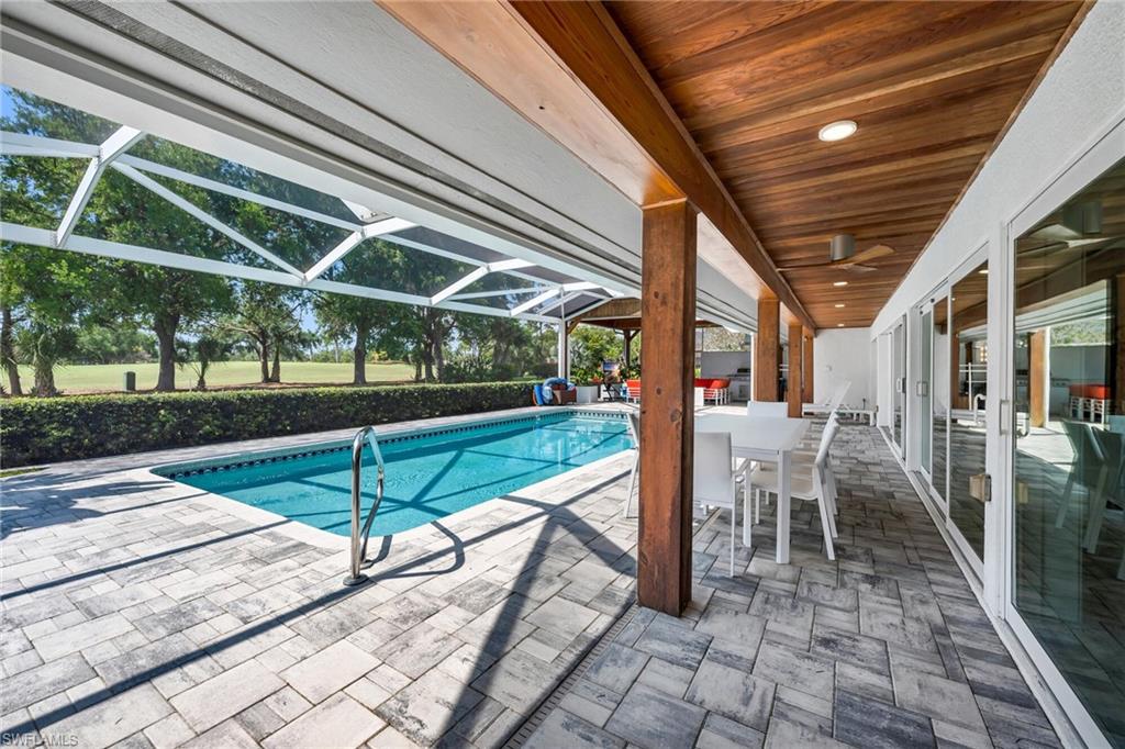 1966 Imperial Golf Course Boulevard Naples, FL 34110 - Photo 25 of 32 a view of outdoor space