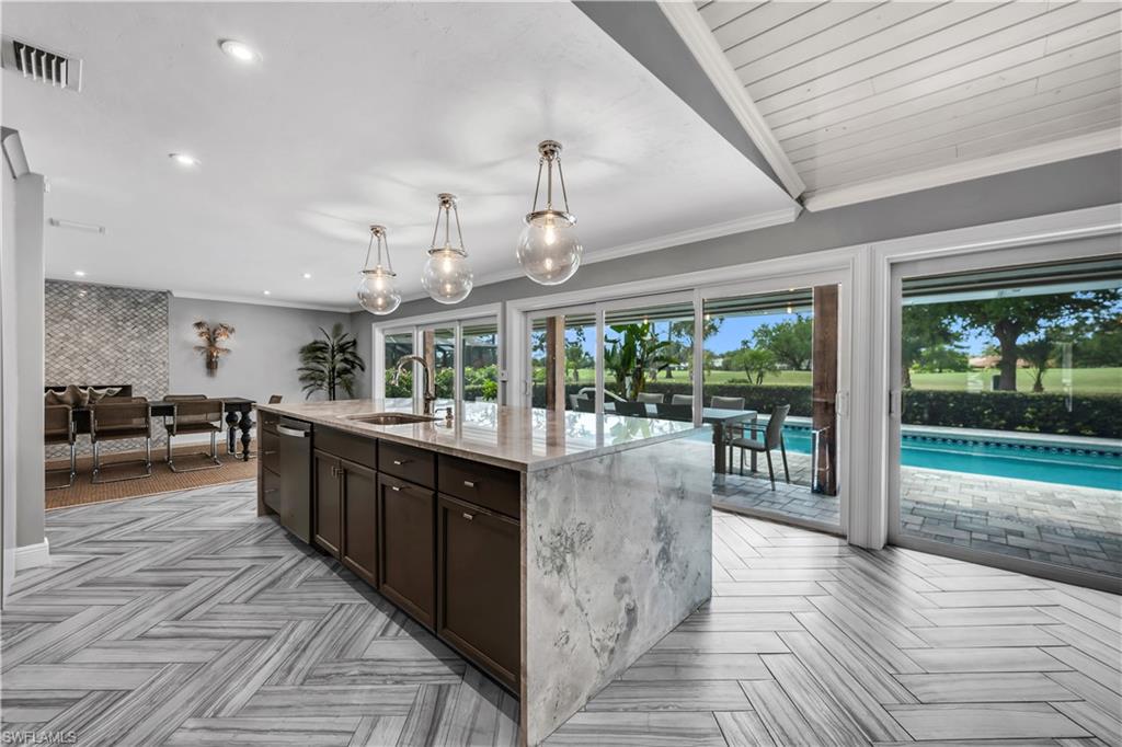 1966 Imperial Golf Course Boulevard Naples, FL 34110 - Photo 7 of 32 a kitchen with lots of counter top space