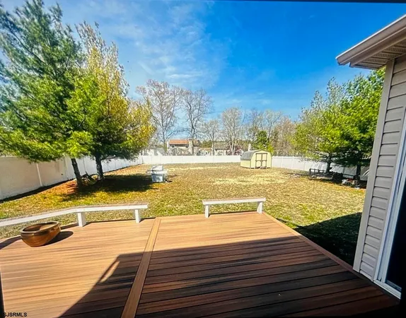 a view of a swimming pool with an outdoor space