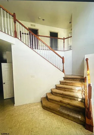 a view of entryway with a front door