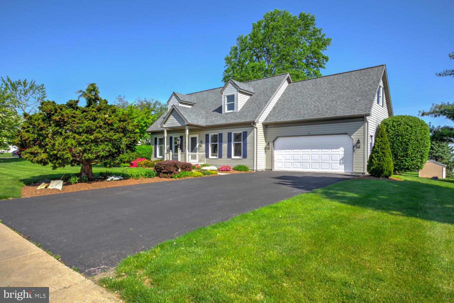 706 Rosemont Drive Lititz, PA 17543 - Photo 4 of 42 Charming home with lush greenery.