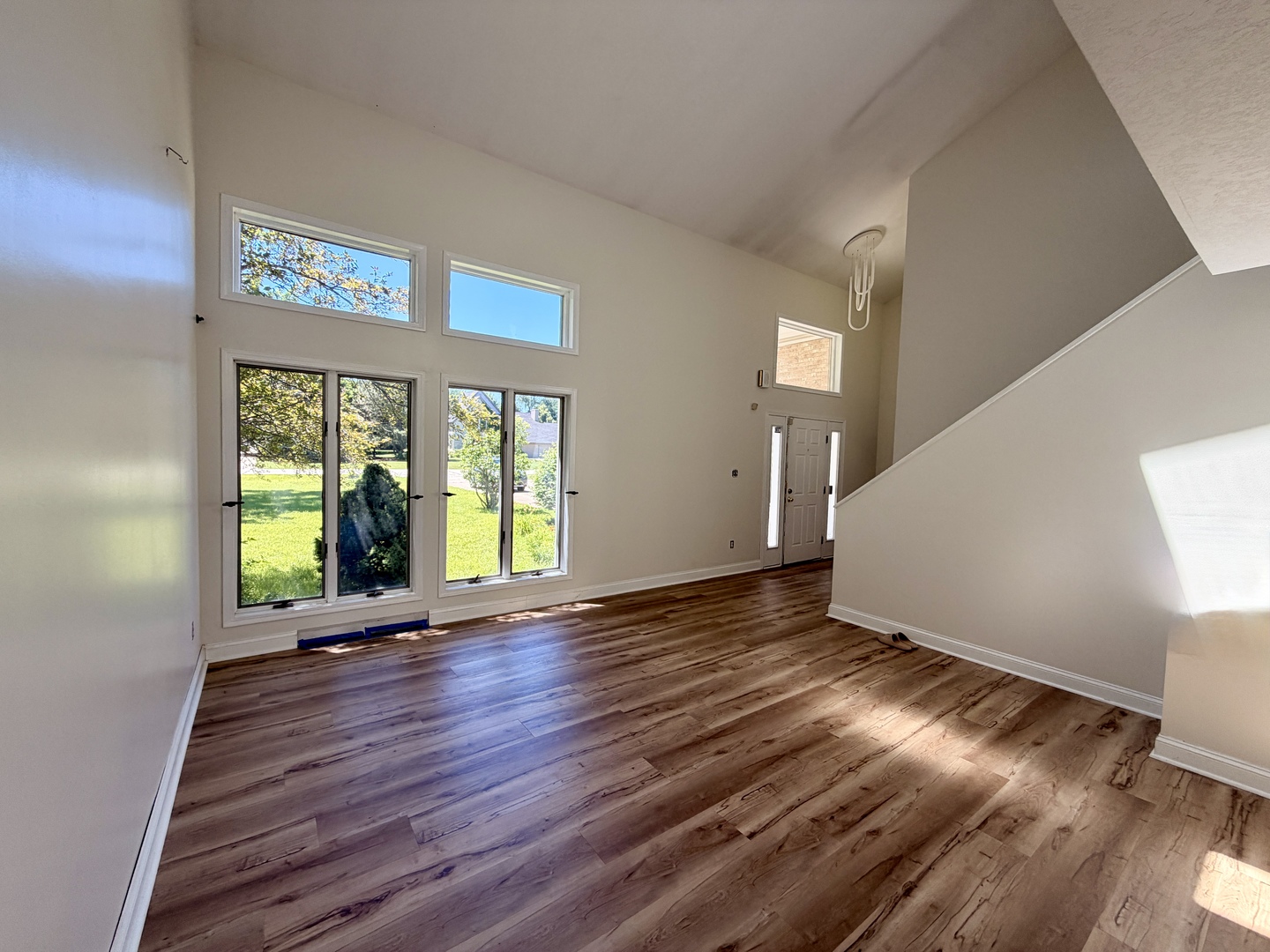 120 Grandin Road Morris, IL 60450 - Photo 23 of 38 a view of an empty room with wooden floor and a window