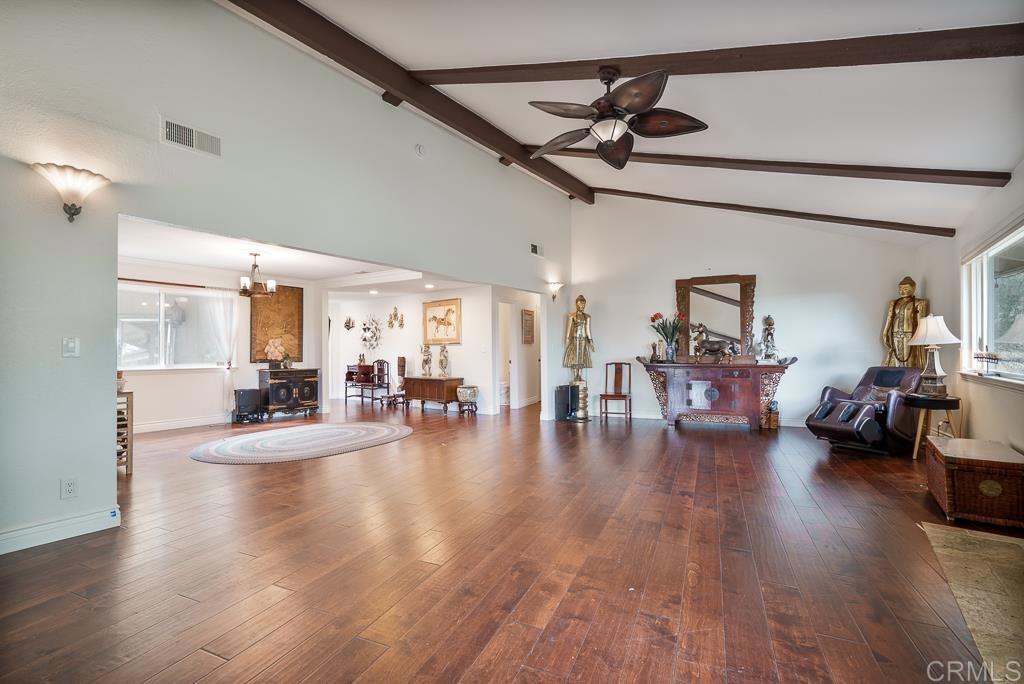 2719 Vía Del Robles Fallbrook, CA 92028 - Photo 15 of 48 a view of a livingroom with furniture and a flat screen tv
