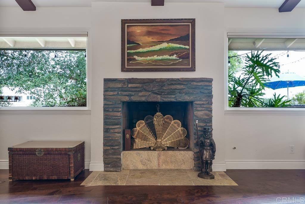2719 Vía Del Robles Fallbrook, CA 92028 - Photo 17 of 48 a living room with furniture and a fireplace