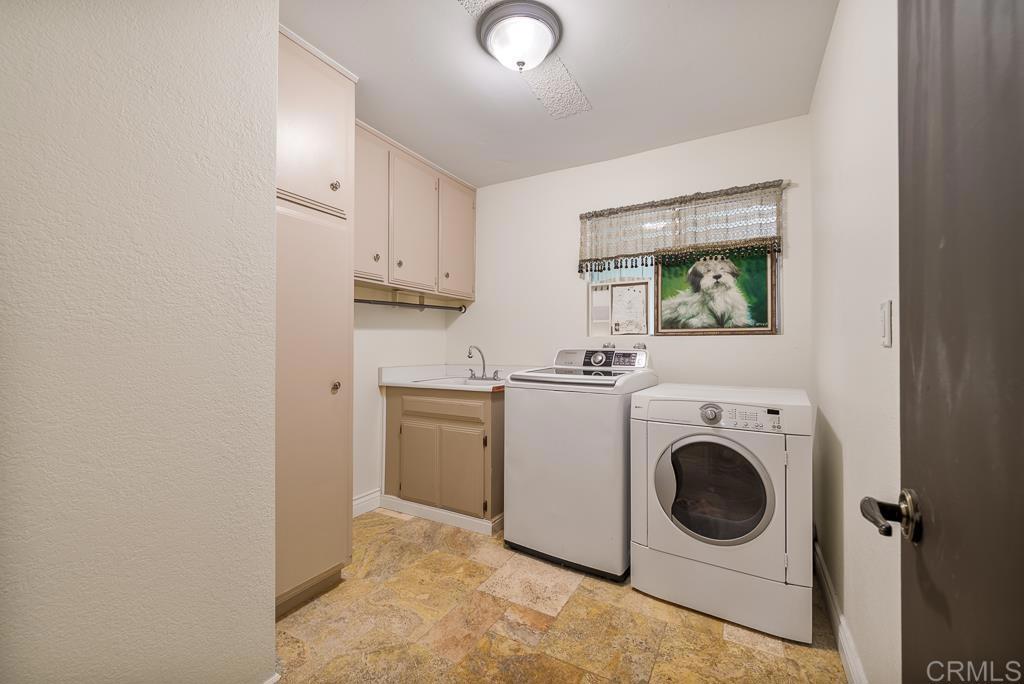 2719 Vía Del Robles Fallbrook, CA 92028 - Photo 26 of 48 a utility room with dryer and washer