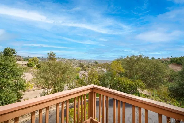 a view of a balcony with an outdoor space