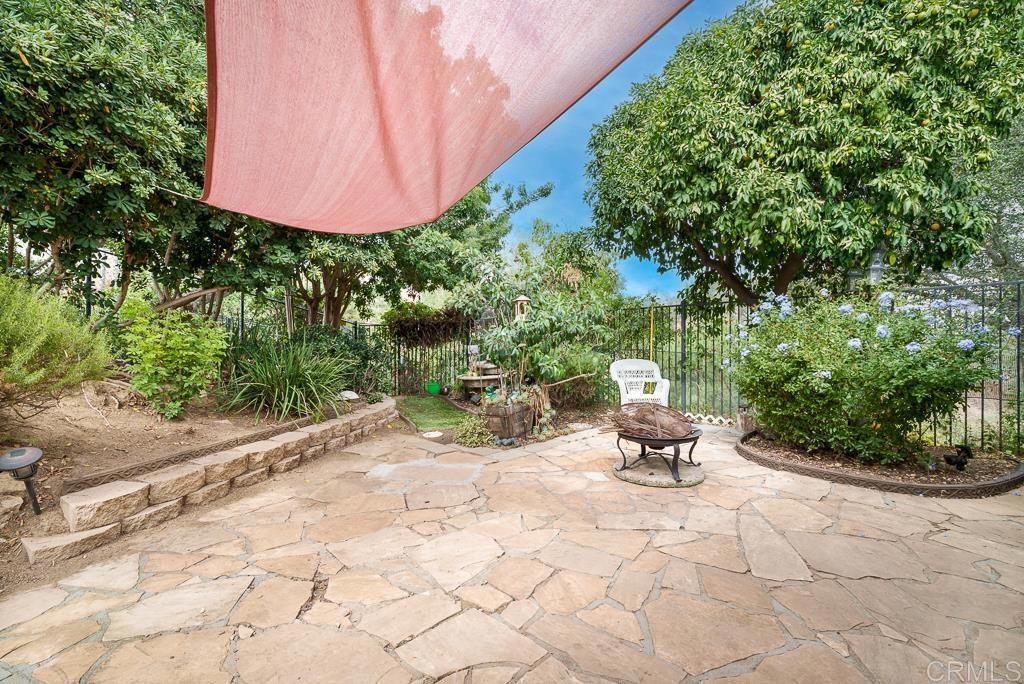 2719 Vía Del Robles Fallbrook, CA 92028 - Photo 38 of 48 a view of a chair and table in backyard