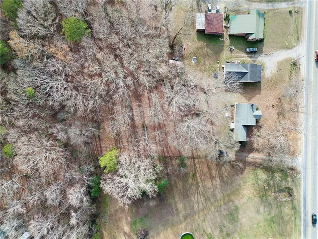 a backyard of a house with outdoor seating