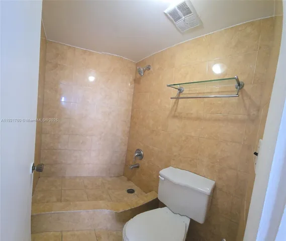 a view of a yard with an outdoor space