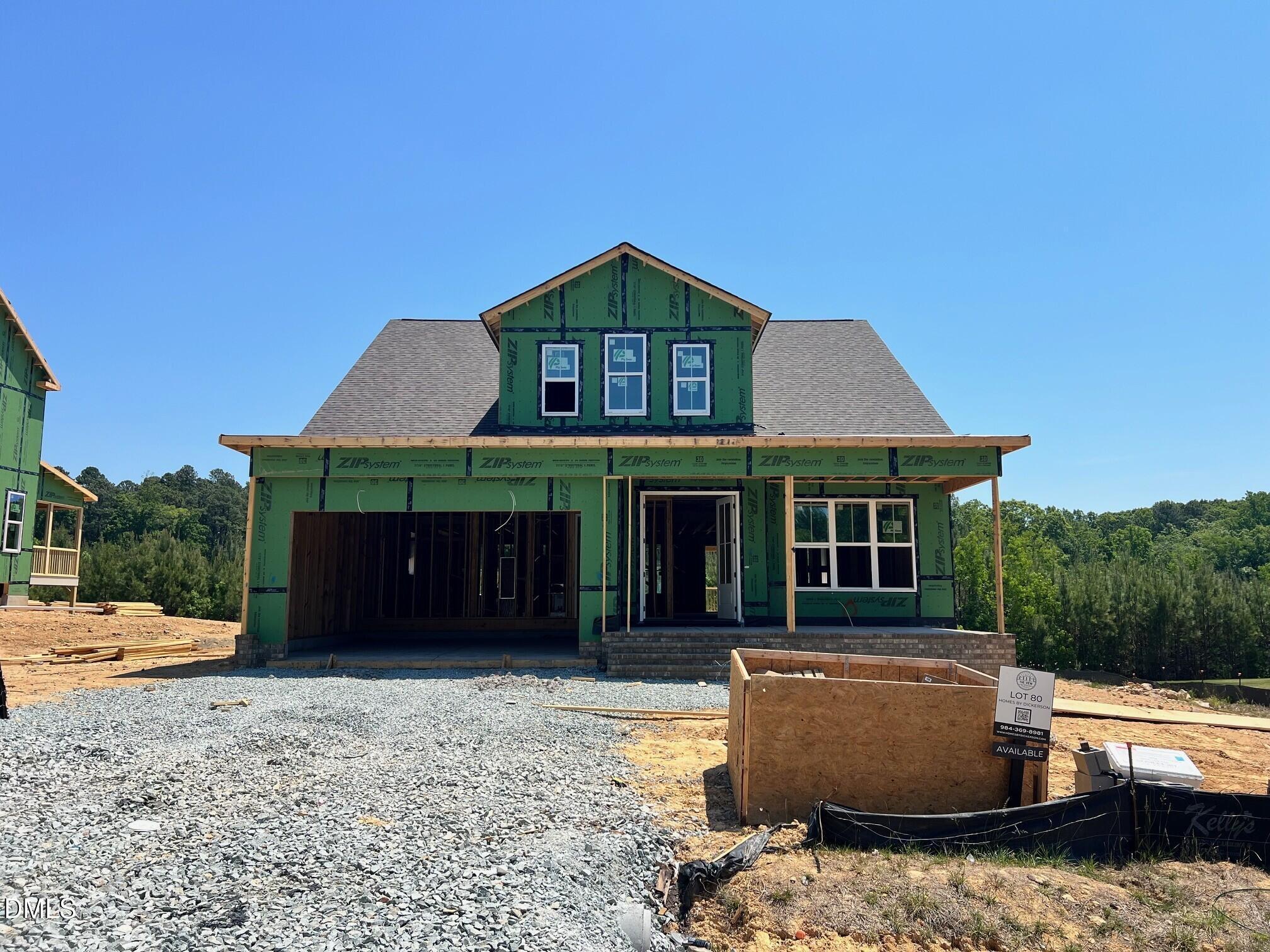 6055 Scalybark Road Durham, NC 27712 - Photo 2 of 13 a front view of a house with a yard