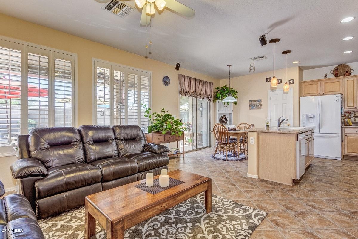2533 West Kit Carson Trail Anthem, AZ 85086 - Photo 13 of 31 Family Room and Kitchen