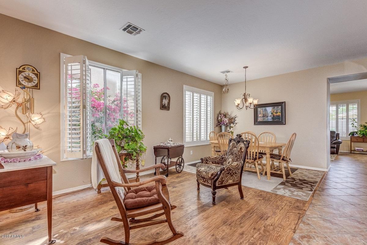 2533 West Kit Carson Trail Anthem, AZ 85086 - Photo 8 of 31 Living Room and Dining