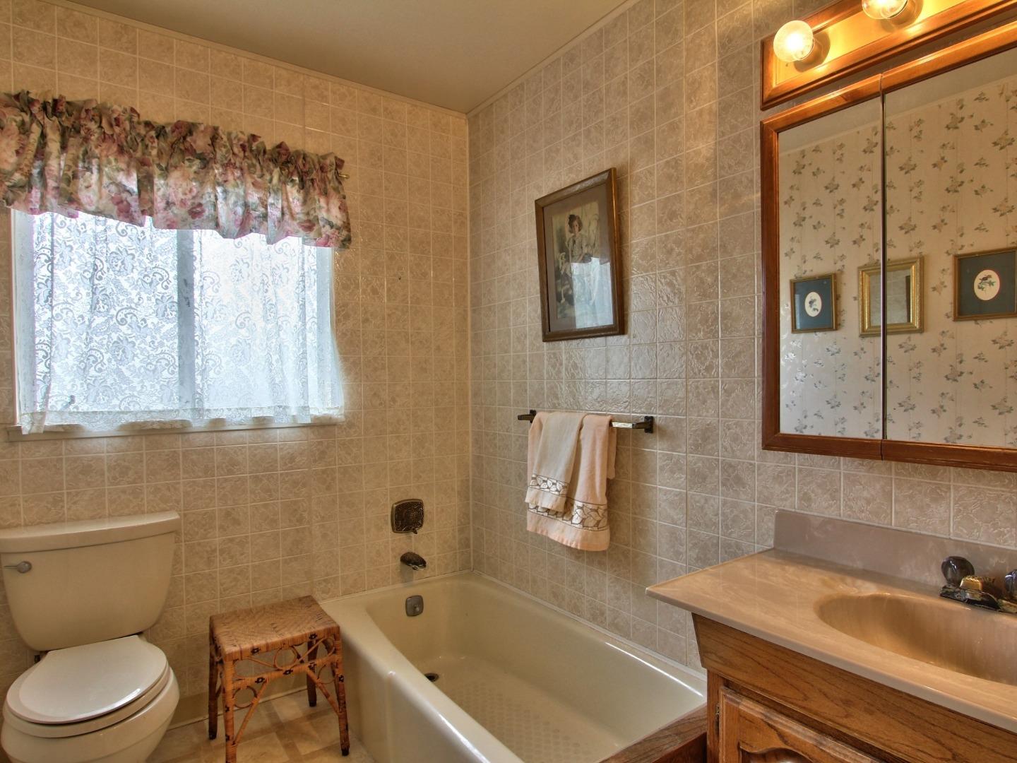 3220 Rio Road Carmel, CA 93923 - Photo 10 of 15 a bathroom with a sink and a bathtub