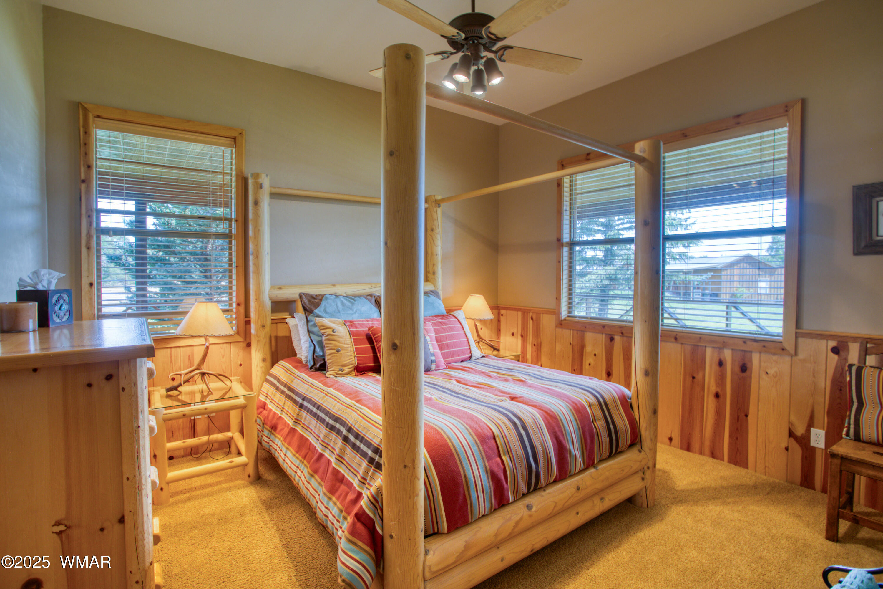 422 B Sponseller Siding Road Pinetop, AZ 85935 - Photo 33 of 74 a bedroom with a bed and window