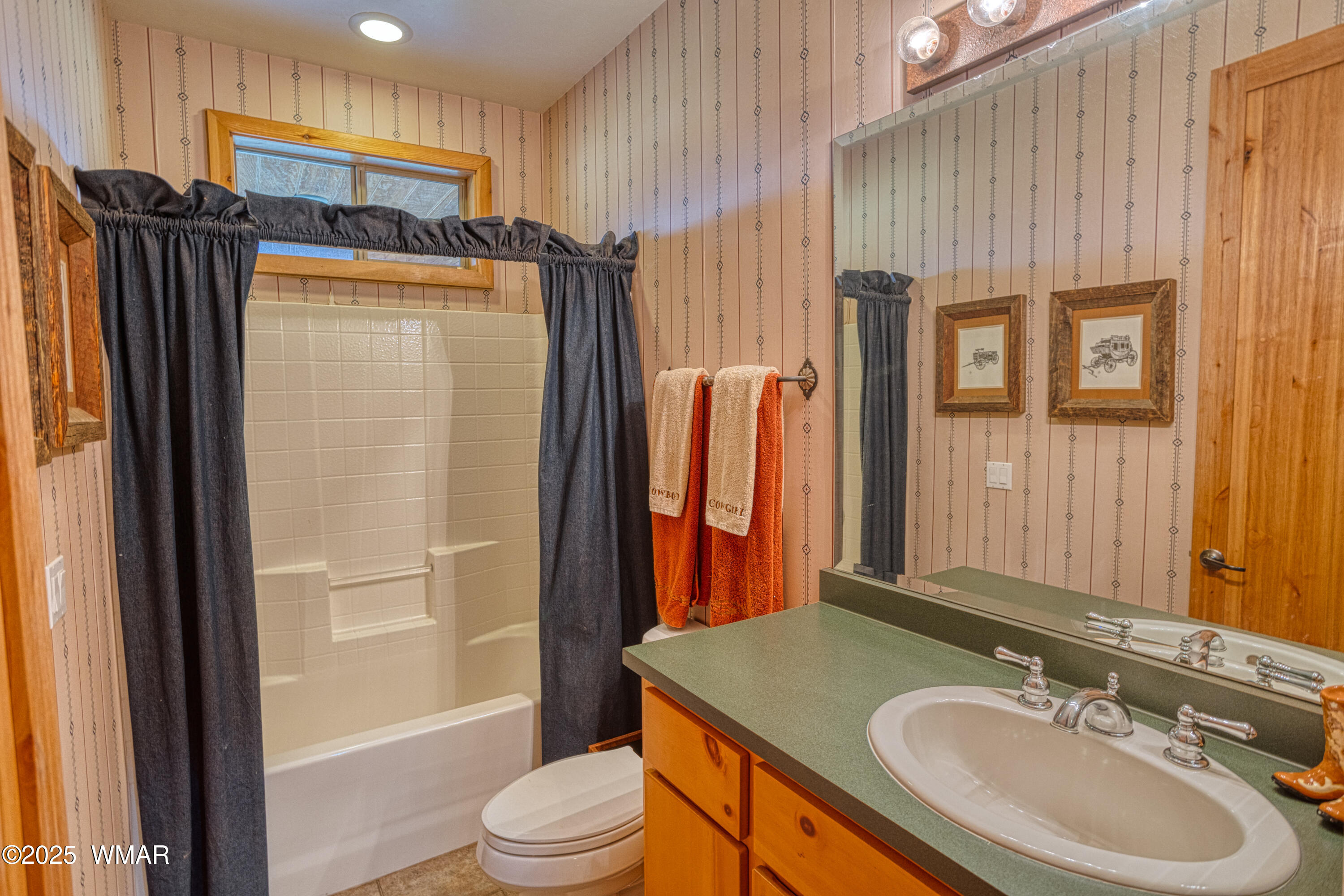 422 B Sponseller Siding Road Pinetop, AZ 85935 - Photo 34 of 74 a bathroom with a sink a toilet and shower