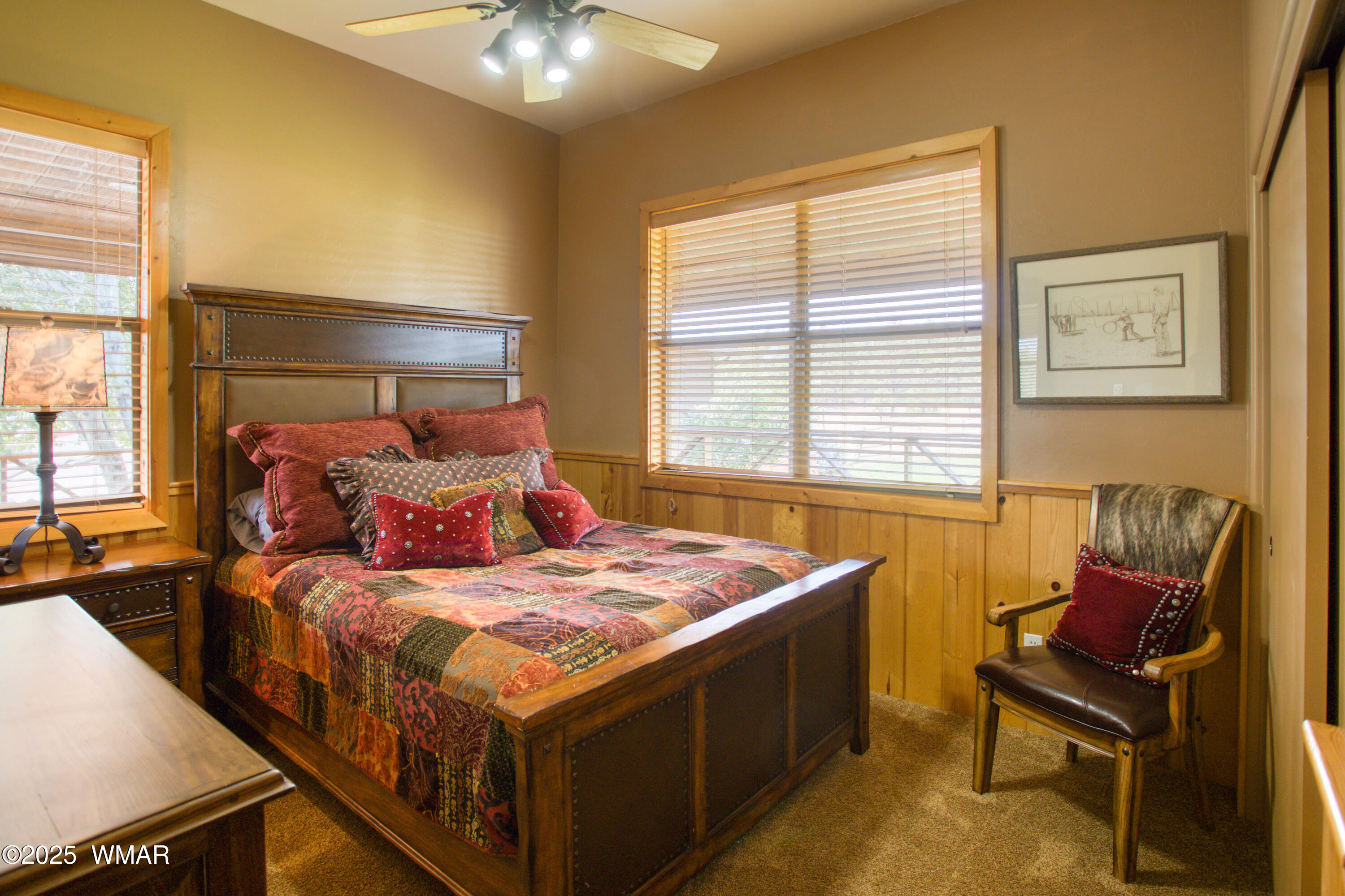 422 B Sponseller Siding Road Pinetop, AZ 85935 - Photo 35 of 74 a bedroom with a bed and a couch