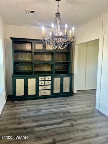 422 B Sponseller Siding Road Pinetop, AZ 85935 - Photo 60 of 74 a view of a room with lots of wooden floor and chandelier