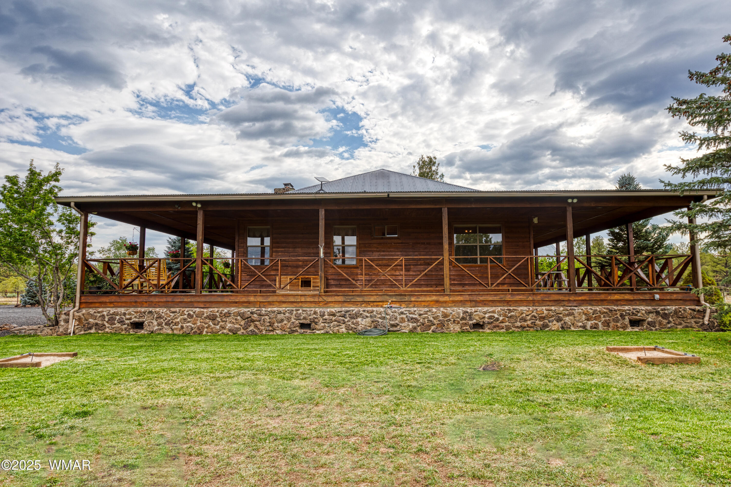 422 B Sponseller Siding Road Pinetop, AZ 85935 - Photo 74 of 74 a view of a house with yard and sitting area