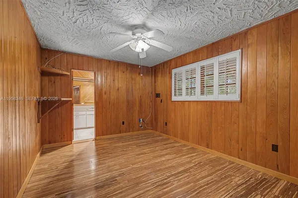 a view of an empty room with a entryway