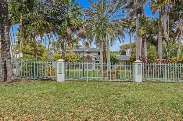 a view of outdoor space with garden and trees