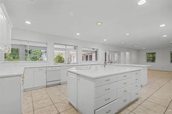 a view of an empty room with glass door