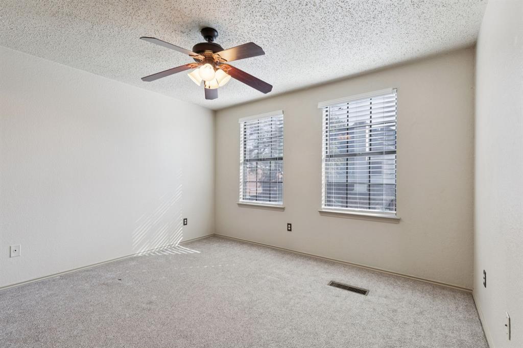 449 Harris Street, Unit 103B Coppell, TX 75019 - Photo 20 of 26 a view of an empty room with a window