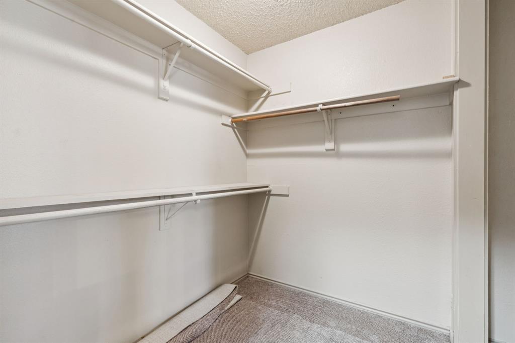 449 Harris Street, Unit 103B Coppell, TX 75019 - Photo 26 of 26 a view of an empty walk in closet