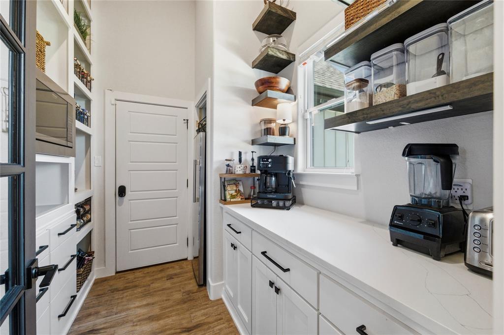 260 Greene Road Weatherford, TX 76087 - Photo 6 of 40 New Pantry with Costco Door to unload groceries from the car