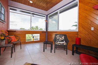 1605 Southwest Dyer Point Road Palm City, FL 34990 - Photo 16 of 19 Patio/Deck. Upstairs Porch