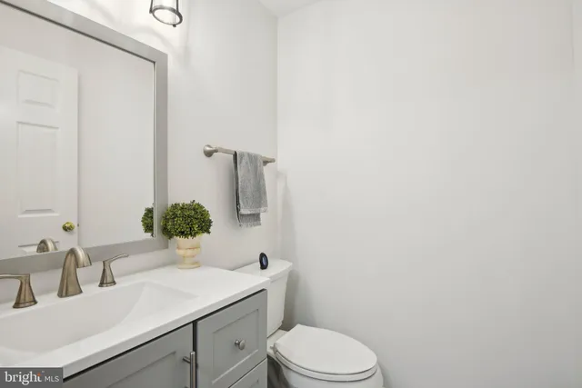 a bathroom with a sink and a toilet