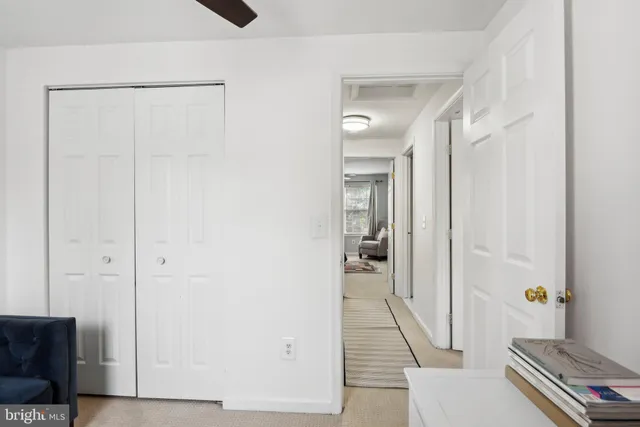 a view of room with furniture and wooden floor